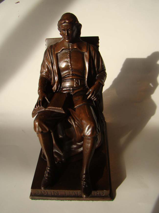 A lovely pair of chocolate bronze finished JOHN HARVARD bookends by Jennings Brothers circa 1920 — image 4